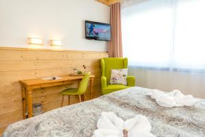 Łóżko lub łóżka w pokoju w obiekcie Landpension Birker - Self Check-In