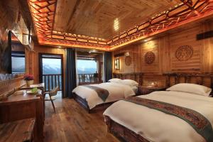 Baike Boutique Hotel客房内的一张或多张床位