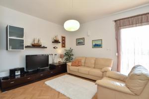 TV a/nebo společenská místnost v ubytování Apartment Bezic