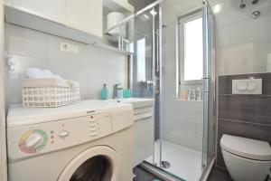 Koupelna v ubytování Apartment Bezic + 37 fotografií