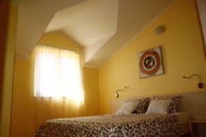Postel nebo postele na pokoji v ubytování Apartment Frzop