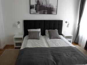 Postel nebo postele na pokoji v ubytování Apartmani SB 42