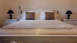 Cama o camas de una habitación en La Maison de Adele