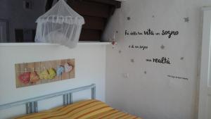Postel nebo postele na pokoji v ubytování Maisonette Tommy