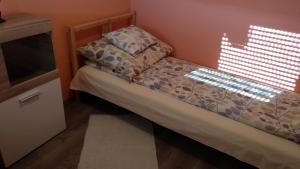 Posteľ alebo postele v izbe v ubytovaní Agria Residence