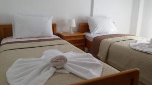 Posteľ alebo postele v izbe v ubytovaní Polychrono Nikos Apartment