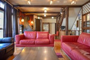 Area soggiorno di Mojo Lodge Hakuba