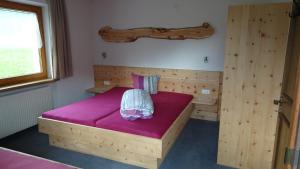 Łóżko lub łóżka w pokoju w obiekcie Haus Patscheider