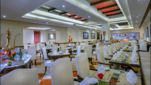 Veitingastaður eða matsölustaður á Hotel Clarks Varanasi Limited