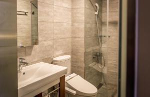 Koupelna v ubytování Greatt Hotel