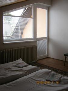 Ein Bett oder Betten in einem Zimmer der Unterkunft Ubytovanie 184, Bed and Braekfast 184
