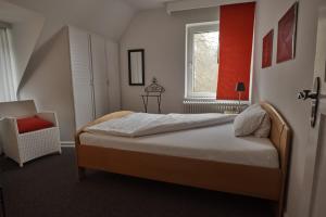 Postel nebo postele na pokoji v ubytování Hotel Burgfeld