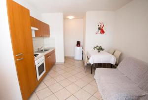 Kuchyňa alebo kuchynka v ubytovaní Apartments Boženka