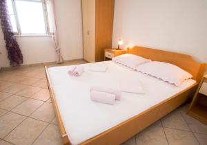 Posteľ alebo postele v izbe v ubytovaní Apartments Boženka