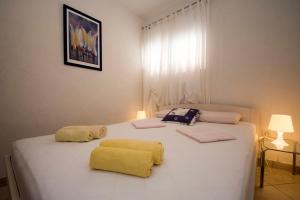 Posteľ alebo postele v izbe v ubytovaní Apartments Boženka