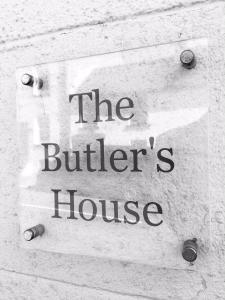 a sign on a building that reads the butter house at The Butler's House in Ulverston