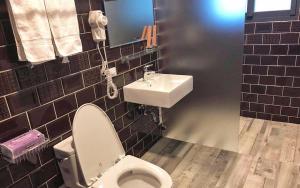 Ein Badezimmer in der Unterkunft Less is more