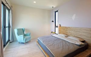 Ein Bett oder Betten in einem Zimmer der Unterkunft Less is more