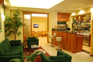 TV a/nebo společenská místnost v ubytování Hotel Gala