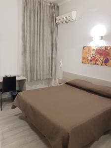 Postel nebo postele na pokoji v ubytování B&b ONE