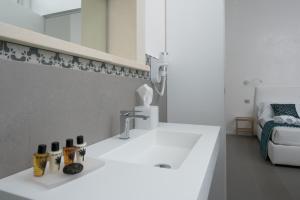 Kopalnica v nastanitvi Caportigia Boutique Hotel