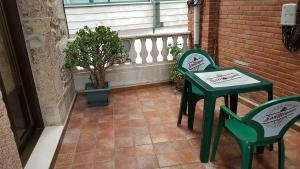 Hostal Arenal的阳台或露台