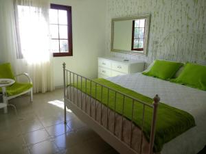Voodi või voodid majutusasutuse Casa Montaña de Tahiche toas