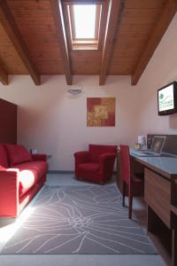 TV a/nebo společenská místnost v ubytování Hotel Del Parco