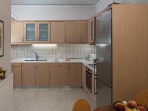 Kuchyňa alebo kuchynka v ubytovaní Beachfront Apartment! + 14 fotografií