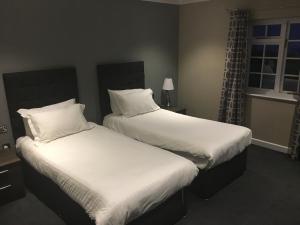 Wild Pheasant Hotel & Spa客房内的一张或多张床位