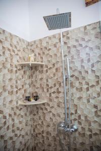 Koupelna v ubytování G&K Stone Suites