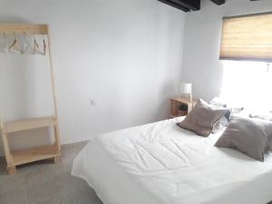 Łóżko lub łóżka w pokoju w obiekcie CH Apartments
