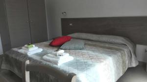 Postel nebo postele na pokoji v ubytování B&B Campu Moru