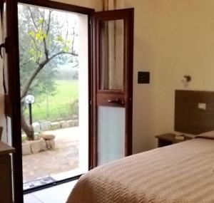 Postel nebo postele na pokoji v ubytování B&B Campu Moru