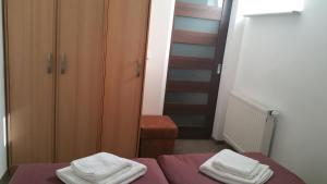 Postel nebo postele na pokoji v ubytování Apartament Esja