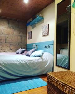 Postel nebo postele na pokoji v ubytování La Torre Mondariz