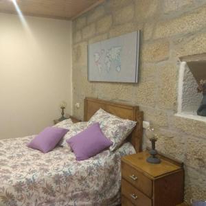 Postel nebo postele na pokoji v ubytování La Torre Mondariz