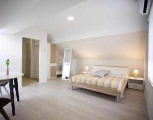 Ένα ή περισσότερα κρεβάτια σε δωμάτιο στο Apartment Bilo