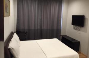 TV a/nebo společenská místnost v ubytování Hotel Conforto