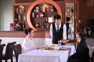Hosté ubytování Erawan Hotel
