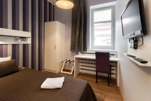 Hotel Traffic Poznań Stare Miasto客房内的一张或多张床位