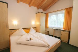 Posteľ alebo postele v izbe v ubytovaní ARBOR Hotel & Apartments