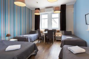 Postel nebo postele na pokoji v ubytování Hotel Traffic Poznań Stare Miasto + 37 fotografií