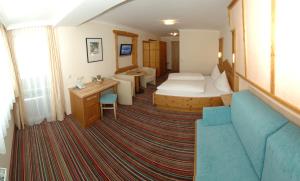 Posteľ alebo postele v izbe v ubytovaní ARBOR Hotel & Apartments