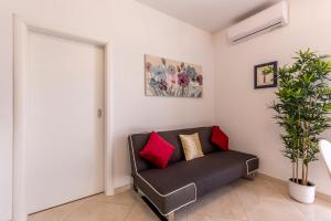 Ein Sitzbereich in der Unterkunft Apartments Petra