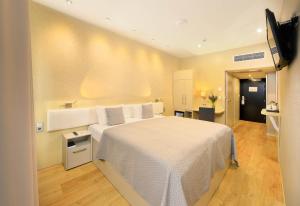 TV a/nebo společenská místnost v ubytování Ametyst Hotel Praha