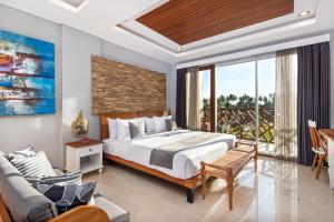 Postel nebo postele na pokoji v ubytování Wadari Retreat Villa Ubud