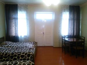 Voodi või voodid majutusasutuse Guest house Katia toas