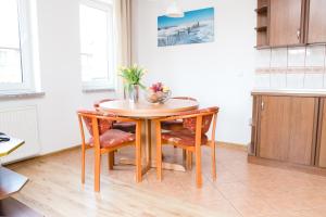 Kuchyňa alebo kuchynka v ubytovaní Apartment Olymp