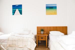 Posteľ alebo postele v izbe v ubytovaní Apartment Olymp